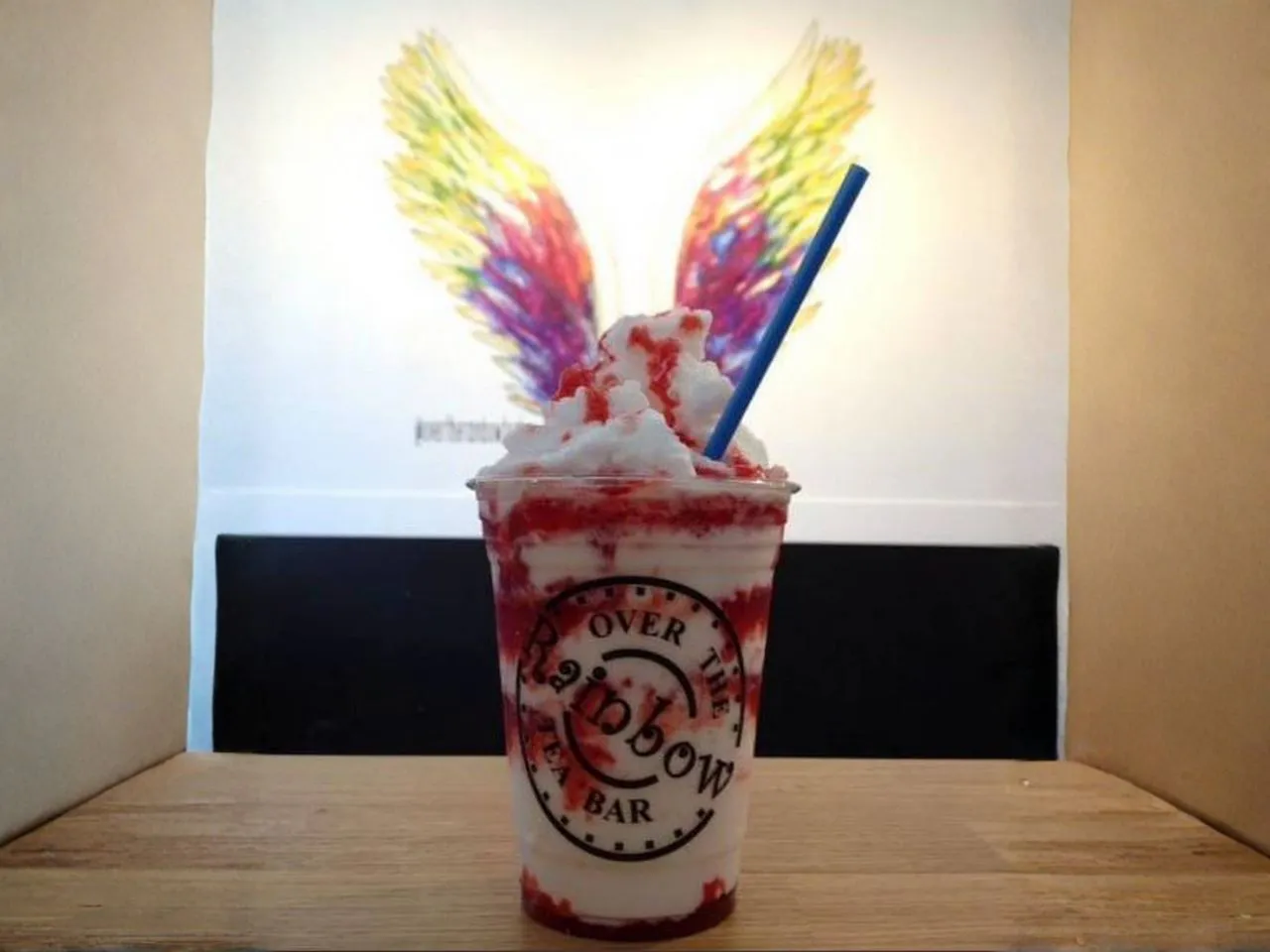 Creamy strawberry layered milk slush drink with whipped cream topping at Over The Rainbow Tea Bar, a Tea House in Renton